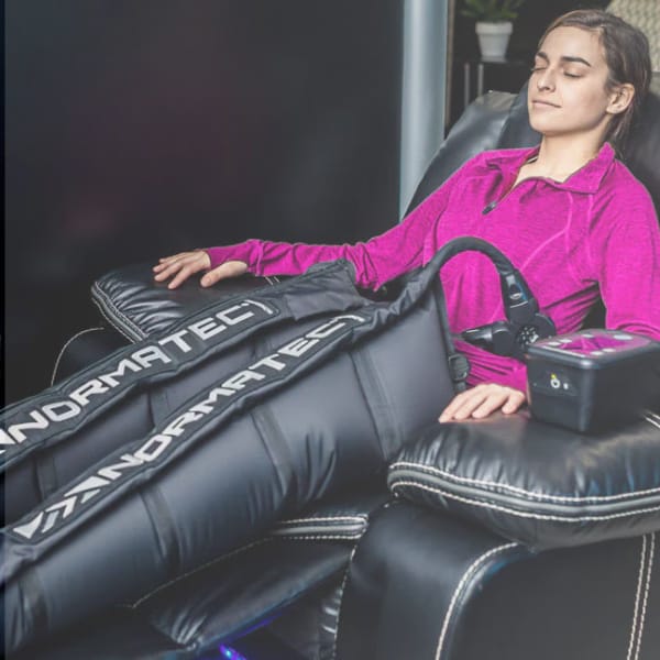 Compression therapy pneumatic boots in recovery lounge at Zivel